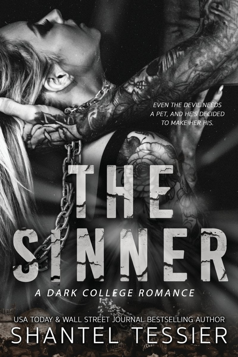 The Sinner by Shantel Tessier dark college romance black and white book cover depicting a woman being wrapped in chains by a heavily tattooed man's arm
