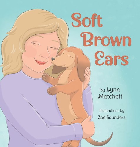 Book Soft Brown Ears by Lynn Matchett, Illustrated by Zoe Saunders. Woman holding wiener dog.