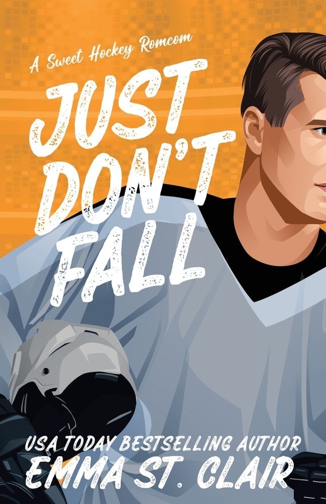 Just Don't Fall by Emma St. Clair book cover showing a graphic-style illustration in warm orange and cool gray tones. Across the upper half, the phrase “A Sweet Hockey Romcom” appears in a white cursive font above the large, textured white block letters of the title “JUST DON’T FALL.” On the right, a close-up of a man in a hockey jersey is visible from the shoulders up, his head cropped mid-view, with neatly styled dark hair. His gloved hand holds a hockey helmet at left foreground, grounding the sporty theme. The background is a stylized depiction of the stands or scoreboard, rendered in softly mottled orange hues. Below the illustration, the author’s name Emma St. Clair is written in bold white script